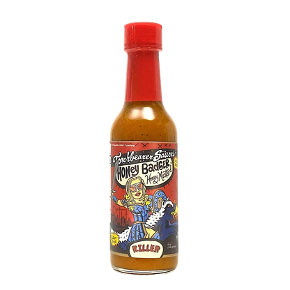 Hot sauce bottle with colorful label on a white background