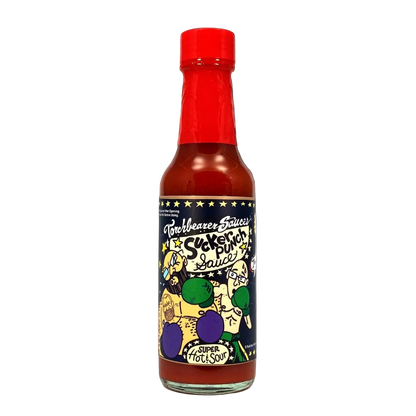 Bottle of Torchbearer Sucker Punch Sauce with colorful label on a white background