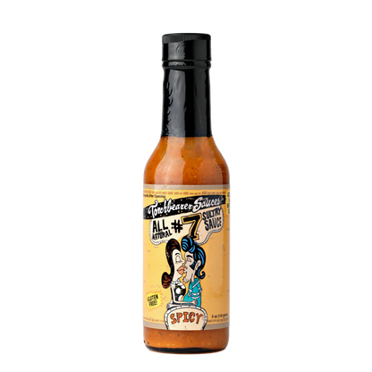 Hot sauce bottle with a colorful label on a white background