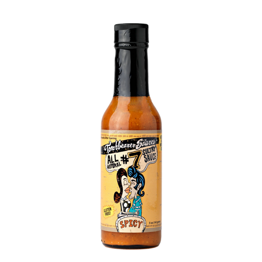 Hot sauce bottle with a colorful label on a white background